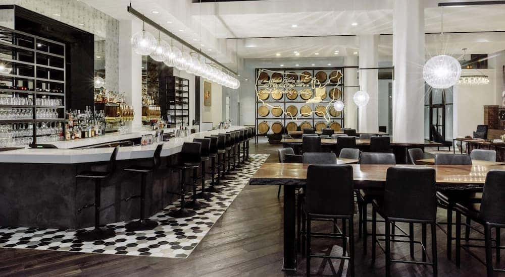 The modern bar area of The Renaissance Cincinnati is shown.