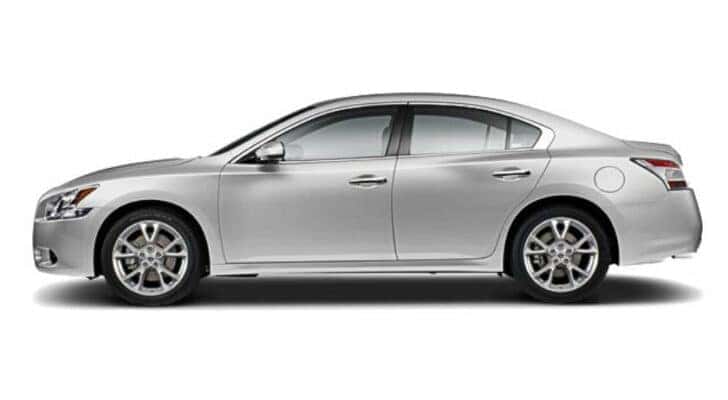 A silver 2014 Nissan Maxima S is angled left.