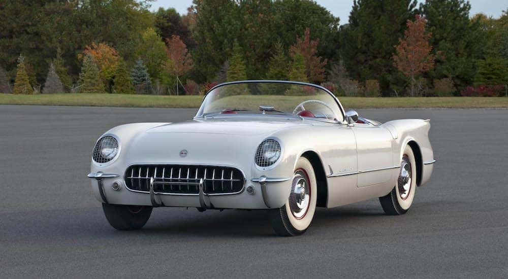 A parked white 1954 Chevy Corvette.