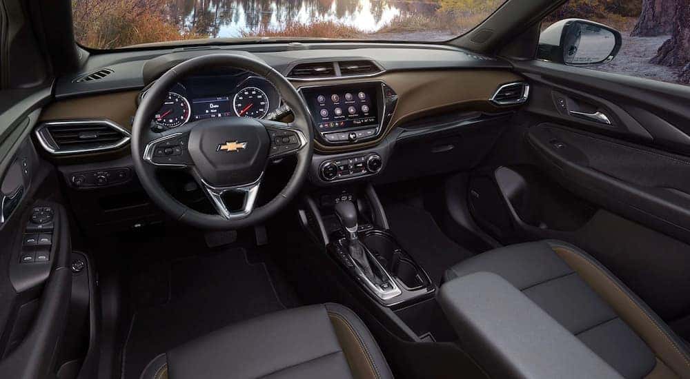 The brown and dark grey interior of a 2021 Chevy Trailblazer is shown.
