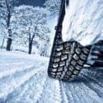 Close-up of a tire on snow.