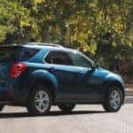 A blue 2016 Chevy Equinox parked.