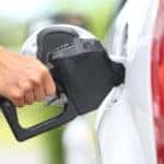 Pumping gas at gas pump