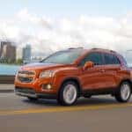 An orange 2016 Chevy Trax from the side.