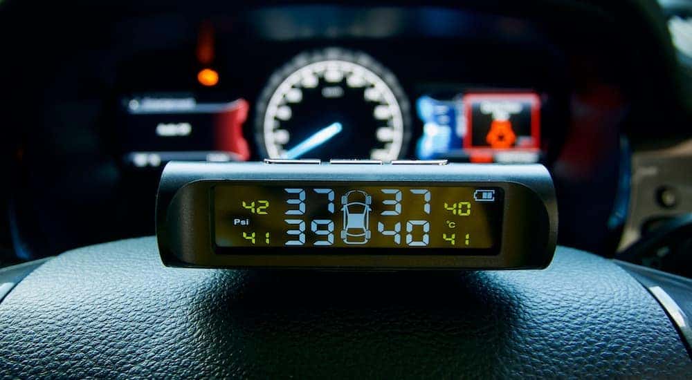 A tire pressure monitor is shown.