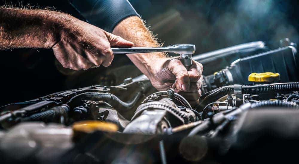 Mechanic repairing an engine.