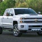 A white 2015 Chevy Silverado 2500 HD.