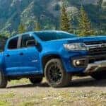 A blue 2022 Chevy Colorado Z71 from the side.
