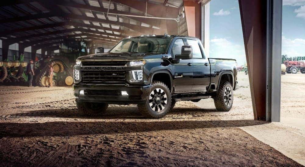 A black 2021 chevy 2021 Silverado 2500 Carhartt Edition is shown from the side after leaving a Chevy dealers in Columbus, Ohio.