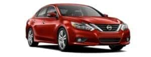 A red 2017 Nissan Altima is angled right.