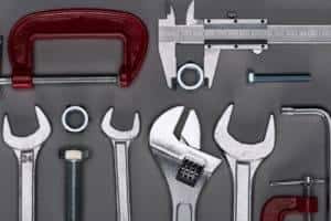 Multiple tools are shown on a gray background in Cincinnati.