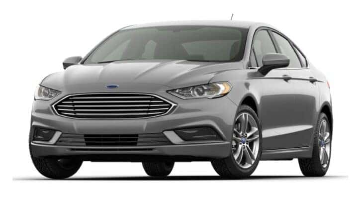 A silver 2017 Ford Fusion SE is angled left.