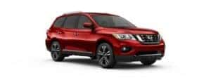 A red 2017 Nissan Pathfinder is angled right.