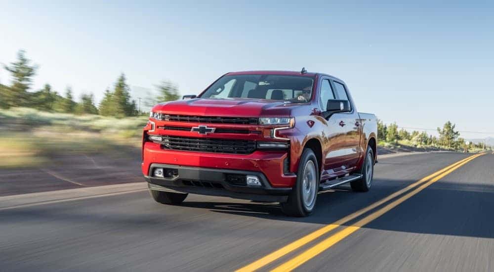 A red 2017 Chevy Silverado 1500 from the front.