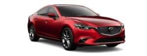 A red 2017 Mazda6 Touring is angled right.