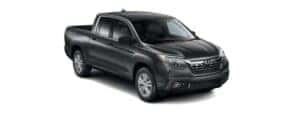 A grey 2017 Honda Ridgeline RT is angled right.