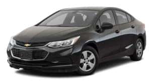 A black 2018 Chevy Cruze is parked and facing left.