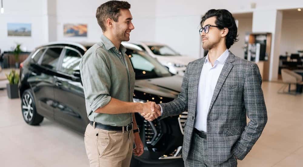 Two people shaking hands.