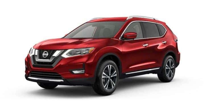 A red 2016 used Nissan Rogue is angled left.