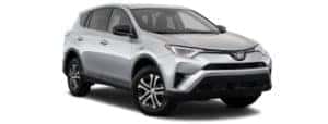 A grey 2018 Toyota RAV4 is facing right.