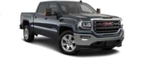 A black 2018 GMC Sierra 1500 is facing right.