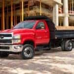 Red 2019 Chevy Silverado 6500 at construction site