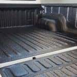 A Chevy truck with a truck bed liner from McCluskey Chevy