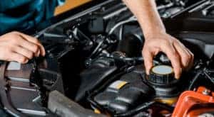 A tech gets ready to finish a oil change at a local Cincinnati Chevy dealer