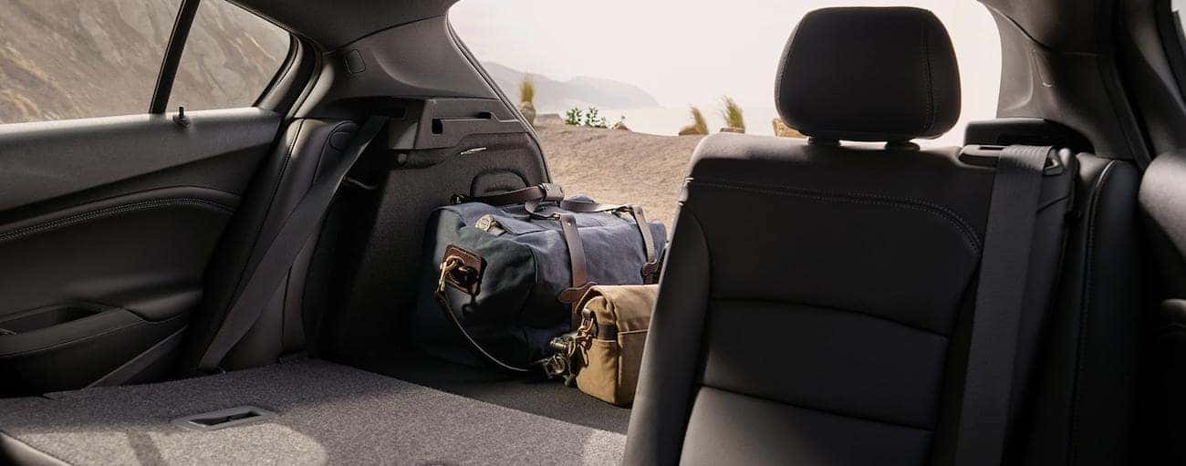 One of the rear seats folded down in a 2019 Chevrolet Cruze