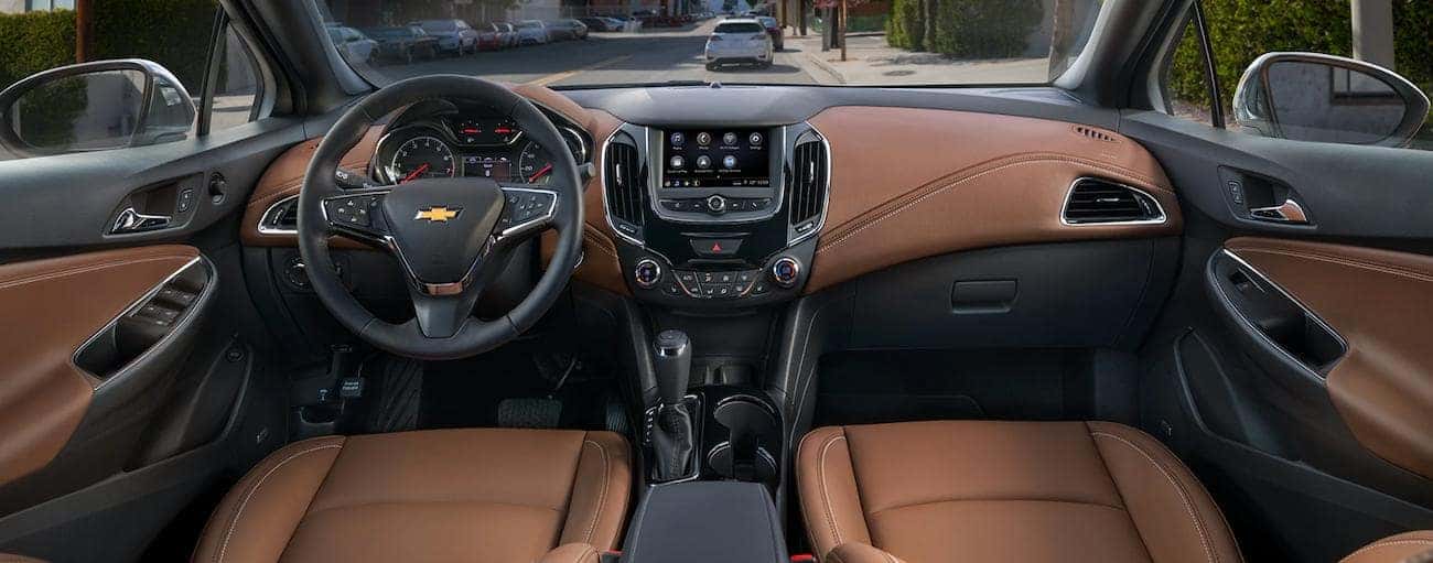 The two-tone brown and black interior of a 2019 Chevy Cruze