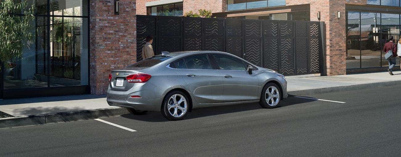 A gray 2019 Chevy Cruze parked on a city street
