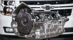 The RTS 10-speed transmission is shown in front of a white 2017 Chevy Tahoe.