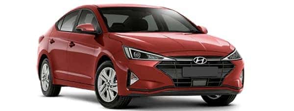 A red 2019 Hyundai Elantra is facing right.