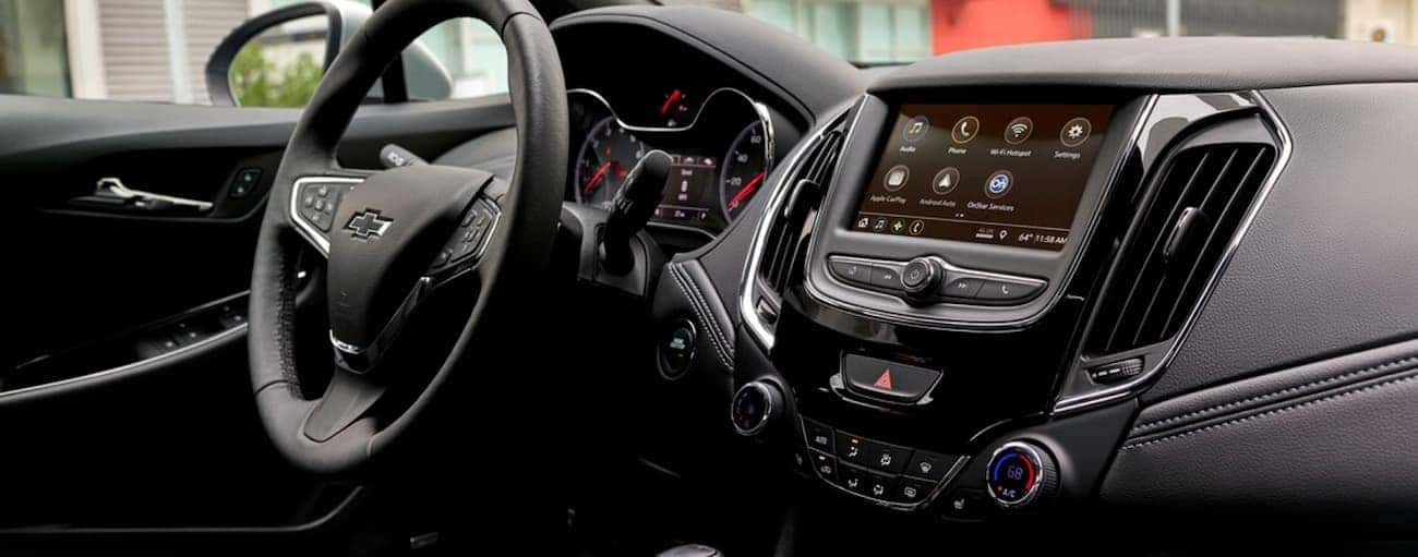 The entertainment system in the 2019 Chevy Cruze, which wins when comparing the 2019 Chevy Cruze vs 2019 Kia Forte in Cincinnati, OH, is shown.