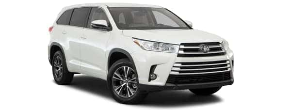 A silver 2017 Toyota Highlander in facing right.