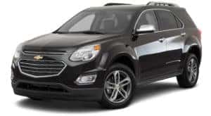 A black 2017 Chevy Equinox is parked and facing left.