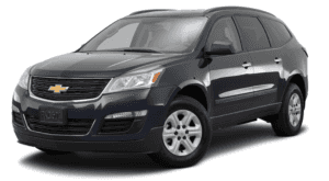 A blue 2017 Chevy Traverse is parked and facing left.
