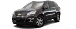 A black 2017 Chevy Traverse is facing left.
