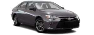 A grey 2017 Toyota Camry is facing right.