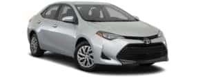 A silver 2917 Toyota Corolla is facing right.