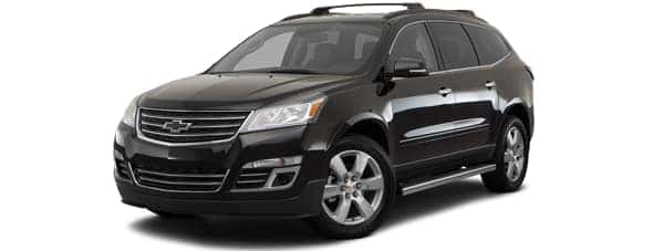 A black 2017 Chevy Traverse is facing left.
