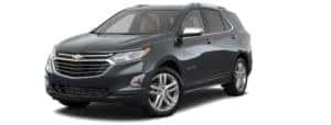 A black 2018 Chevy Equinox is facing left.