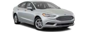A silver 2018 Ford Fusion is facing right.