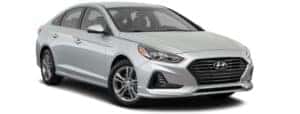 A silver 2018 Hyundai Sonata is facing right.