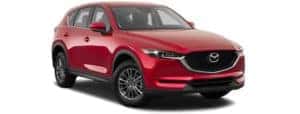 A red 2018 Mazda CX-5 is facing right.