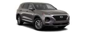 A grey 2019 Hyundai Santa Fe is facing right.
