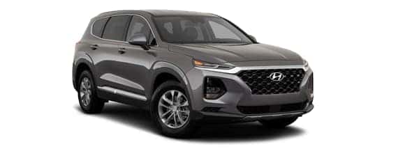 A grey 2019 Hyundai Santa Fe is facing right.