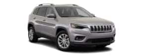A silver 2019 Jeep Cherokee is facing right.