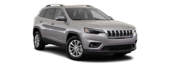 A silver 2019 Jeep Cherokee is facing right.