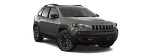 A dark grey 2019 Jeep Cherokee Trailhawk is angled right.